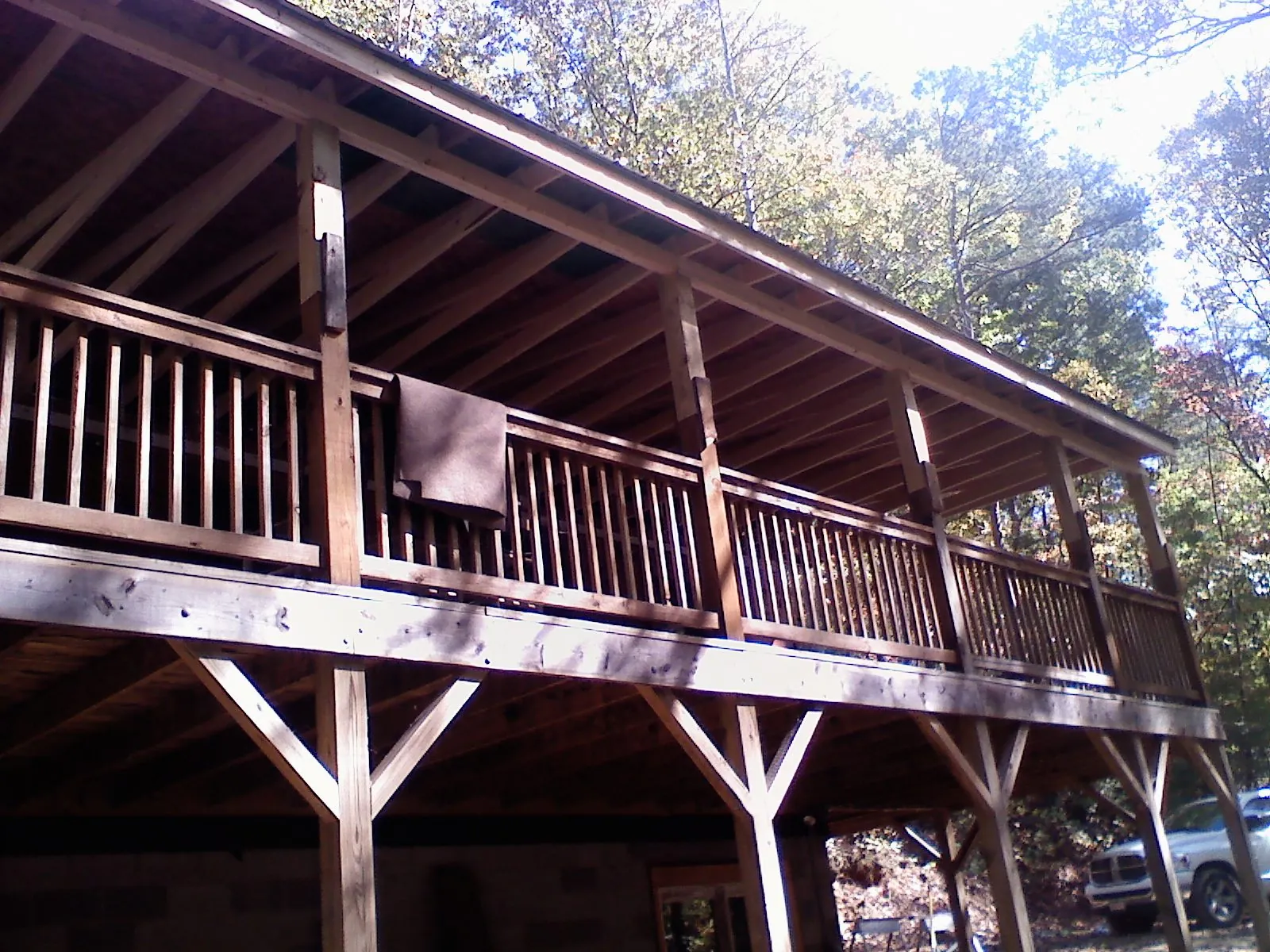Timber framing under a new elevated porch and deck — Roof Leak Repair in Hamden by Roofing Brothers